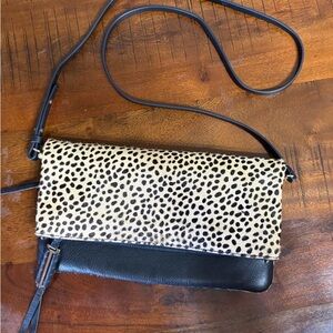 Cheetah and black leather Crossbody Bag in Black and Tan. (Covet)